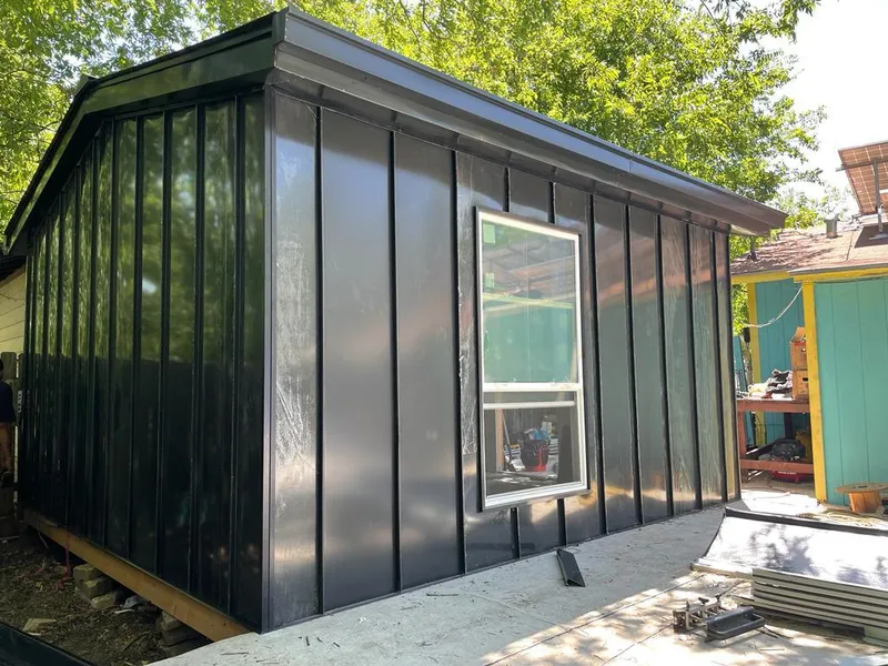 Black standing seam metal wall panels for Roof Inspection in River Park