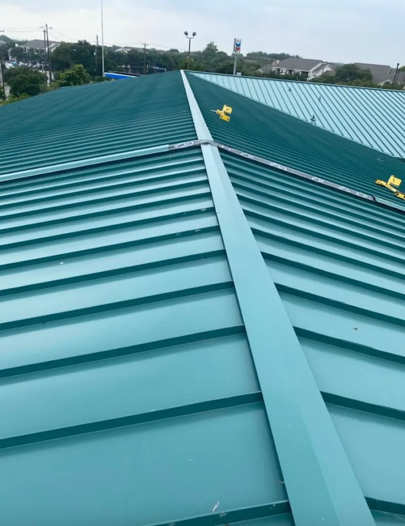 Green commercial metal roof ridge and valley for Metal Roof Repair in River Park